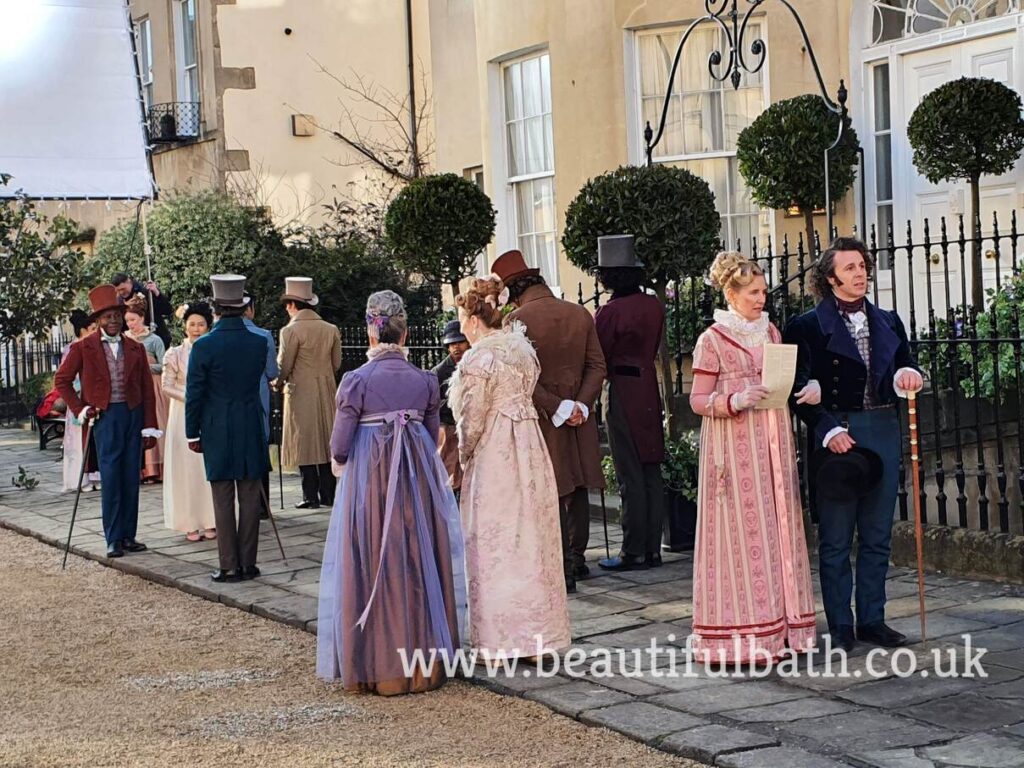 Bridgerton actors promenading on set in Bath